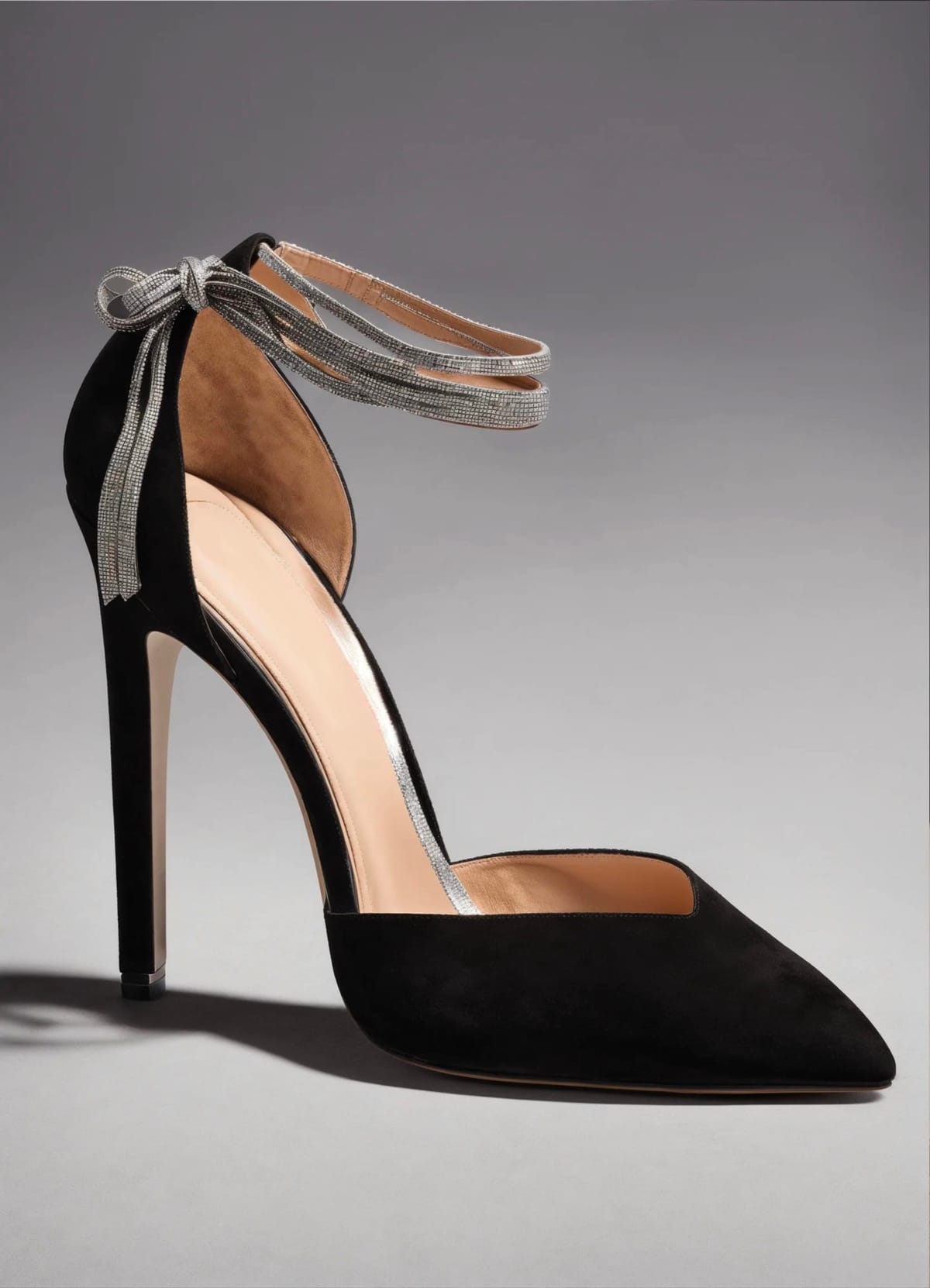 Black suede pump with silver ties